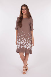 A model wearing size 10 of the ROBBIE 3/4 Sleeve Shift Dress Place M Bird in colour NaturalWht, from the front, showing the whole outfit