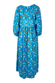 Product shot of the Alice Gathered Dress in colour Speckle (Blue), from the back