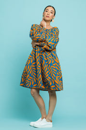 Model Katie wearing size 10 of the Frankie Shift Dress in colour Leaf, from the front, showing the whole outfit