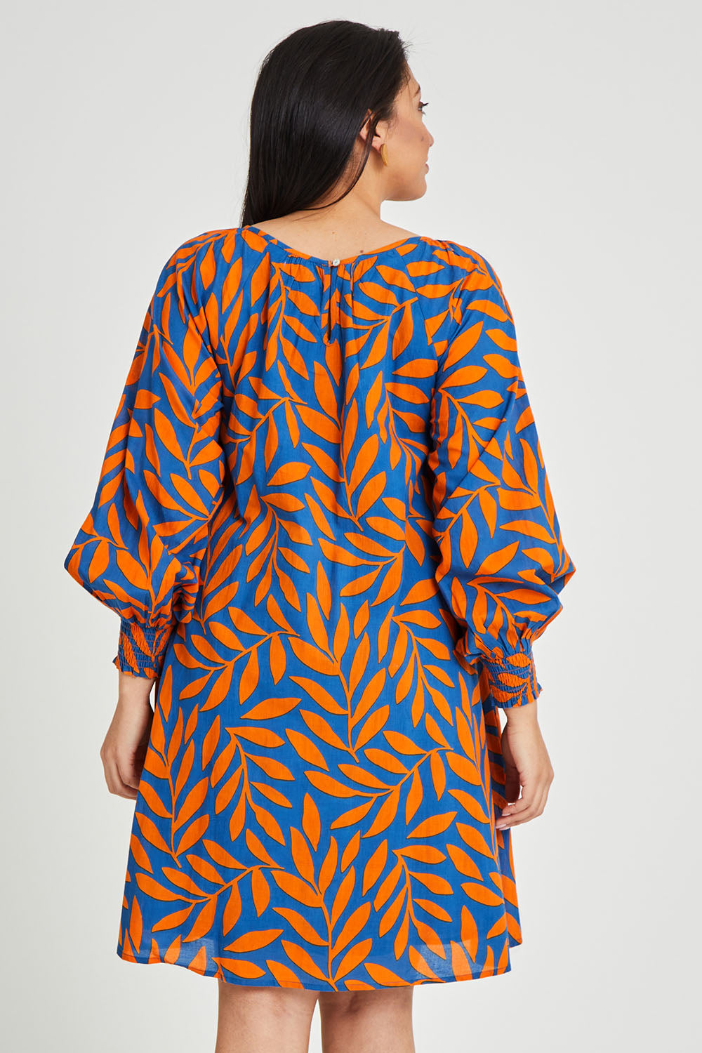 Model Terri-Leigh wearing size 14 of the Frankie Shift Dress in colour Leaf, from the back