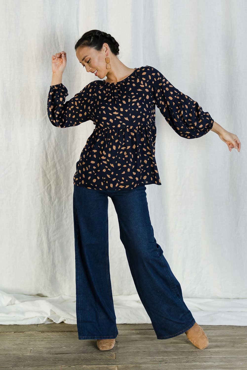 Model Katie wearing size 10 of the Dianna Blouse in colour Spot (Blue), from the front, showing the whole outfit