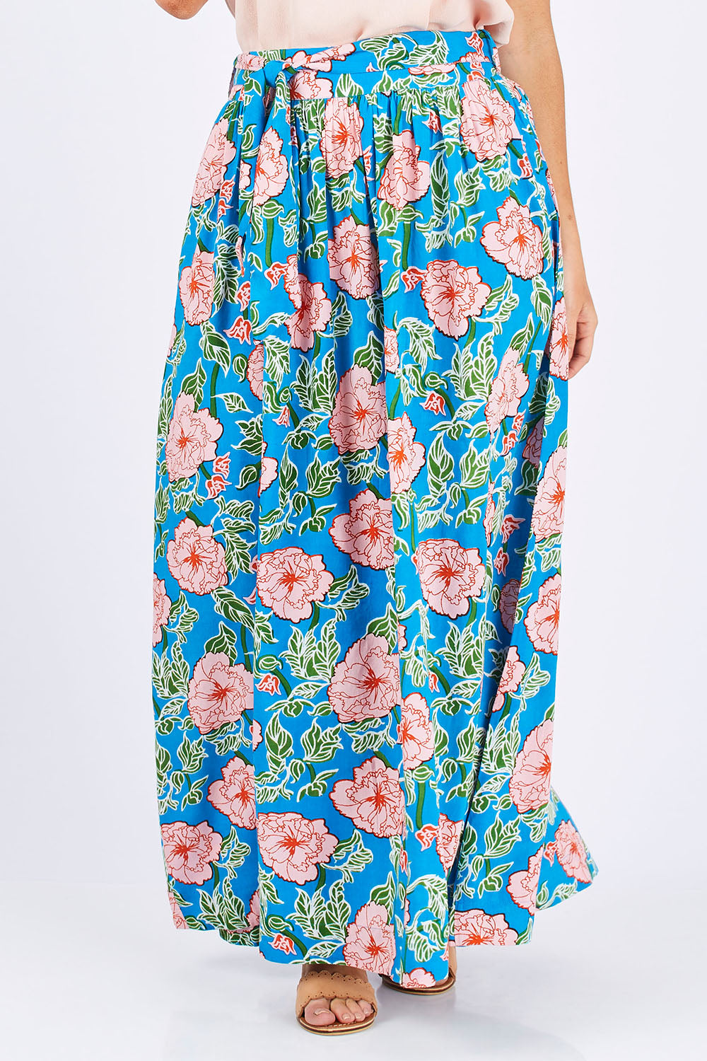 Model Laura wearing size 12 of the Loretta Maxi Skirt Mojito in colour Blue (Blue), from the front, cropped image