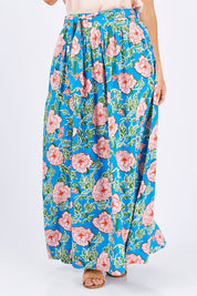 Model Laura wearing size 12 of the Loretta Maxi Skirt Mojito in colour Blue (Blue), from the front, cropped image