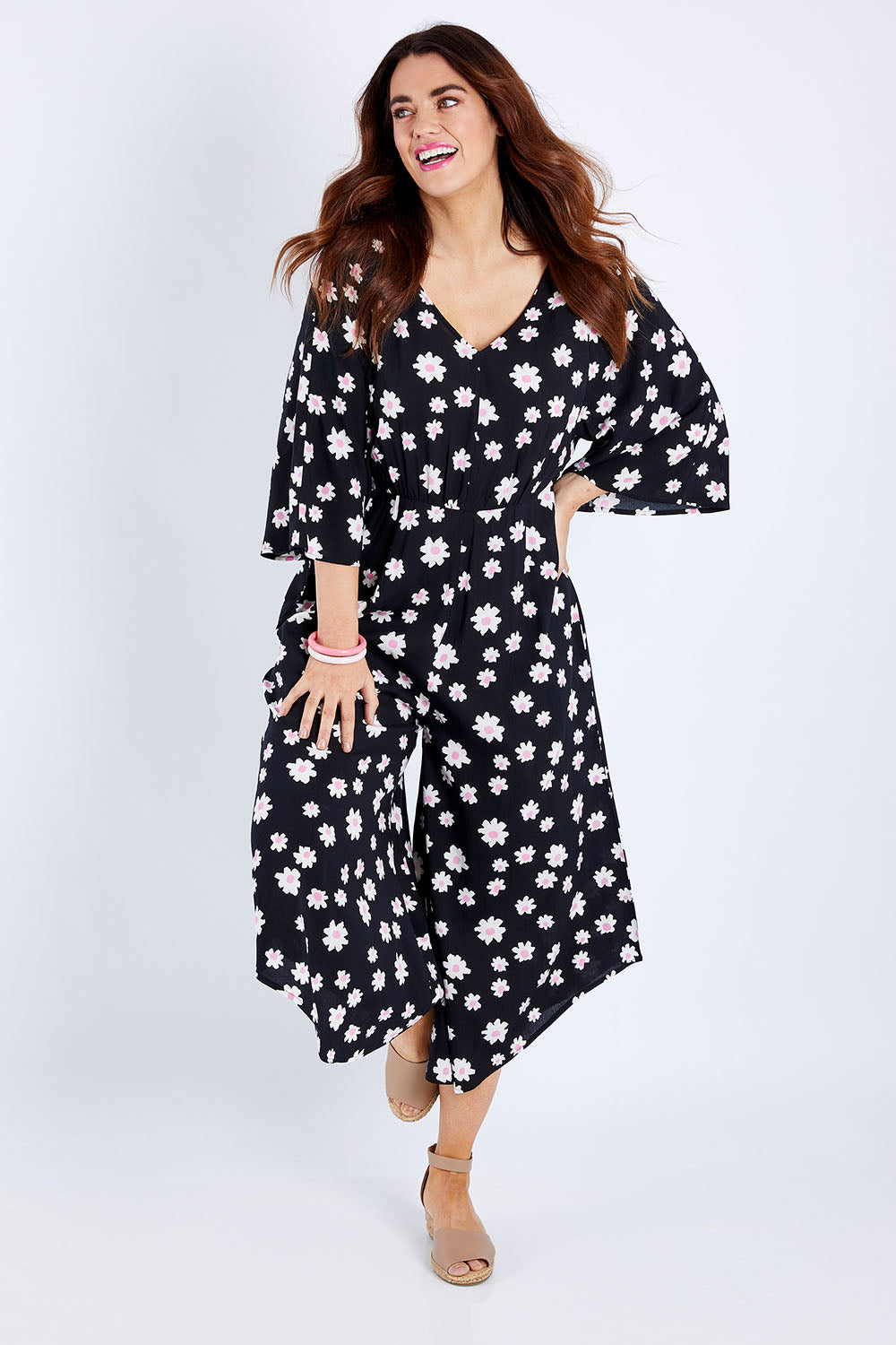 Model Laura wearing size 14 of the Savanna Kimono Jumpsuit in colour Daisychain (Blue), from the front, showing the whole outfit