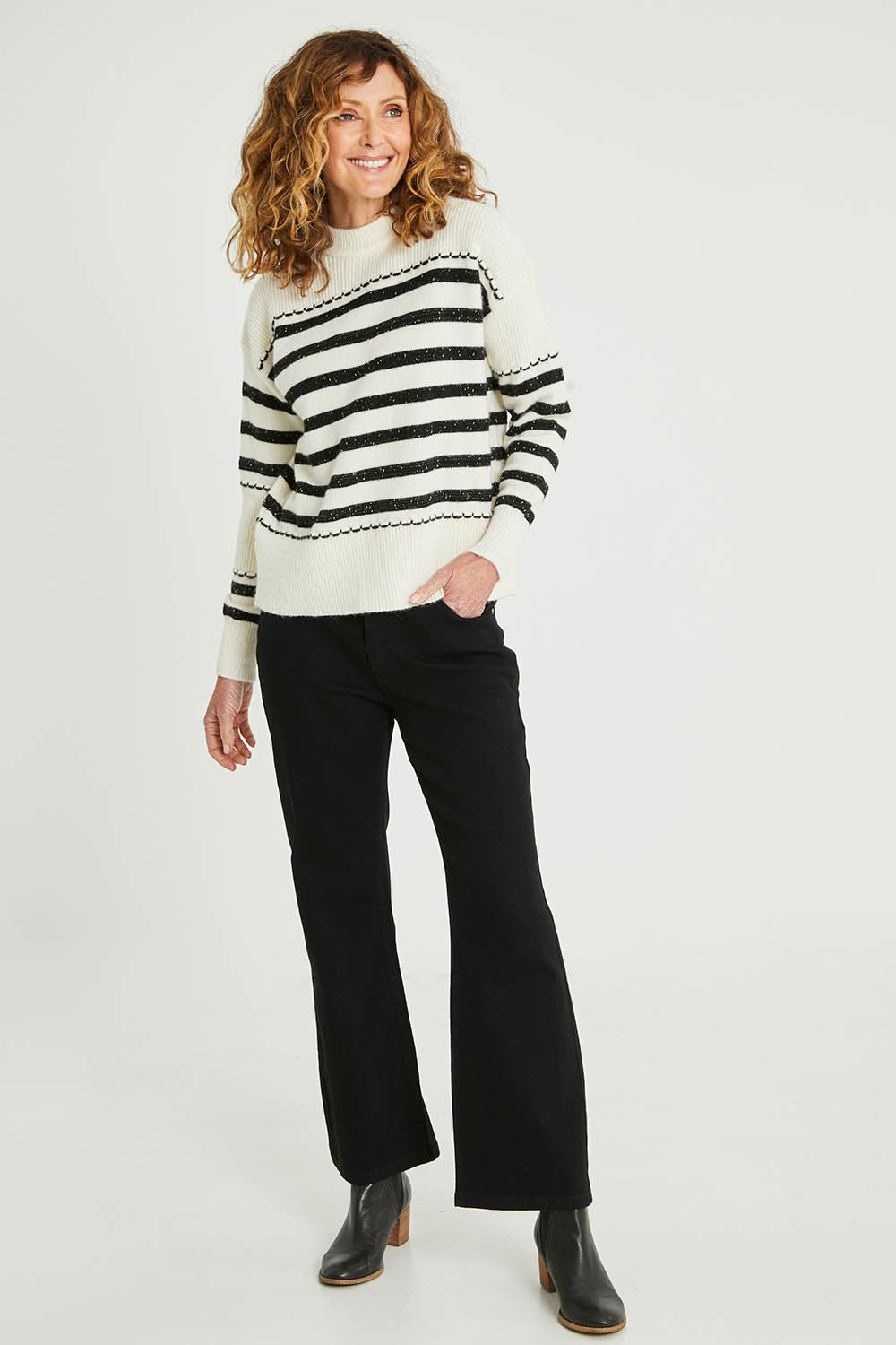 Model Emma wearing size S of the Stripe Detail Knit Jumper in colour Ivory (White), from the front, showing the whole outfit