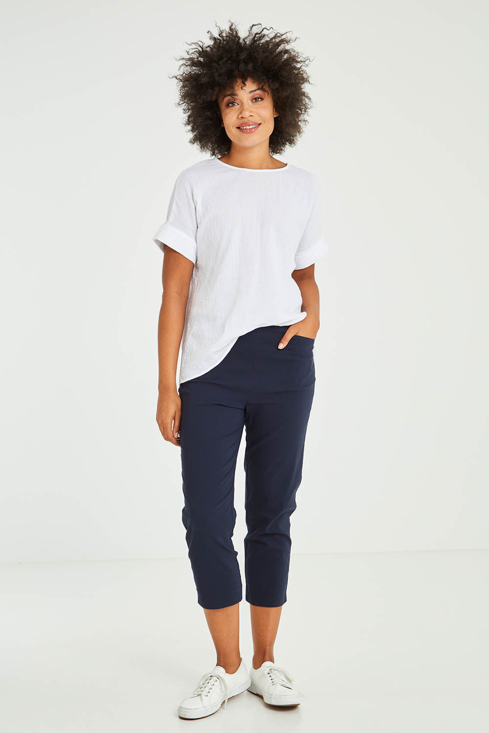 Model Olivia wearing size S of the Zara Pant in colour Navy (Blue), from the front, showing the whole outfit