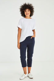 Model Olivia wearing size S of the Zara Pant in colour Navy (Blue), from the front, showing the whole outfit