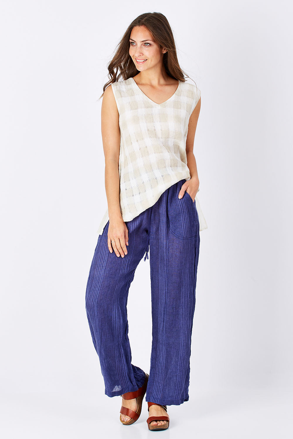 Model Anna wearing size S of the Monte Pant in colour Navy (Blue), from the front, showing the whole outfit