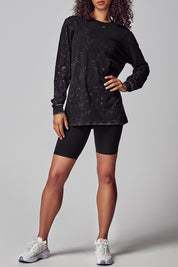 A model wearing the Hollywood 90'S Relax L/S Tee in colour Blackwash (Black), from the front, showing the whole outfit