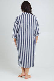 Model Poppy wearing the Oversized Cotton Linen Sleep Shirt in colour Navystripe (Blue), from the back