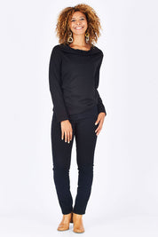 Model Summer wearing size 10 of the Skinny Leg Cord Pull On Pant in colour Black (Black), from the front, showing the whole outfit