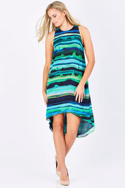Model Maddy wearing size 10 of the Lianne Hiin colourLow Dress - GreenStri (Green), from the front, showing the whole outfit