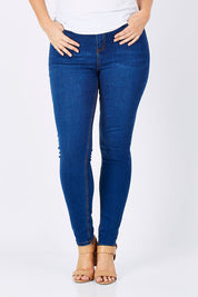 Model Jess wearing size 14 of the Diana Skinny in colour Denim (Blue), from the front, cropped image