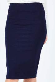Model Chelsea wearing size 10 of the Preloved The Ponte Knee Length Pencil Skirt in colour Navy (Blue), from the front, cropped image