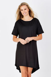 Model Maddy wearing size S of the Jasmine Tin colourshirt Dress - Black (Black), from the front, cropped image