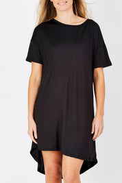 Model Maddy wearing size S of the Jasmine Tin colourshirt Dress - Black (Black), from the front, cropped image