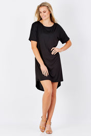 Model Maddy wearing size S of the Jasmine Tin colourshirt Dress - Black (Black), from the front, showing the whole outfit