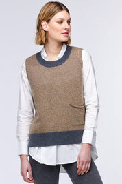 A model wearing the Birdseye Vest in colour Charcoal, from the front, showing the whole outfit