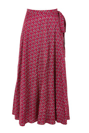 Product shot of the Grace Cotton Wrap Skirt in colour Corfu (Red), from the front