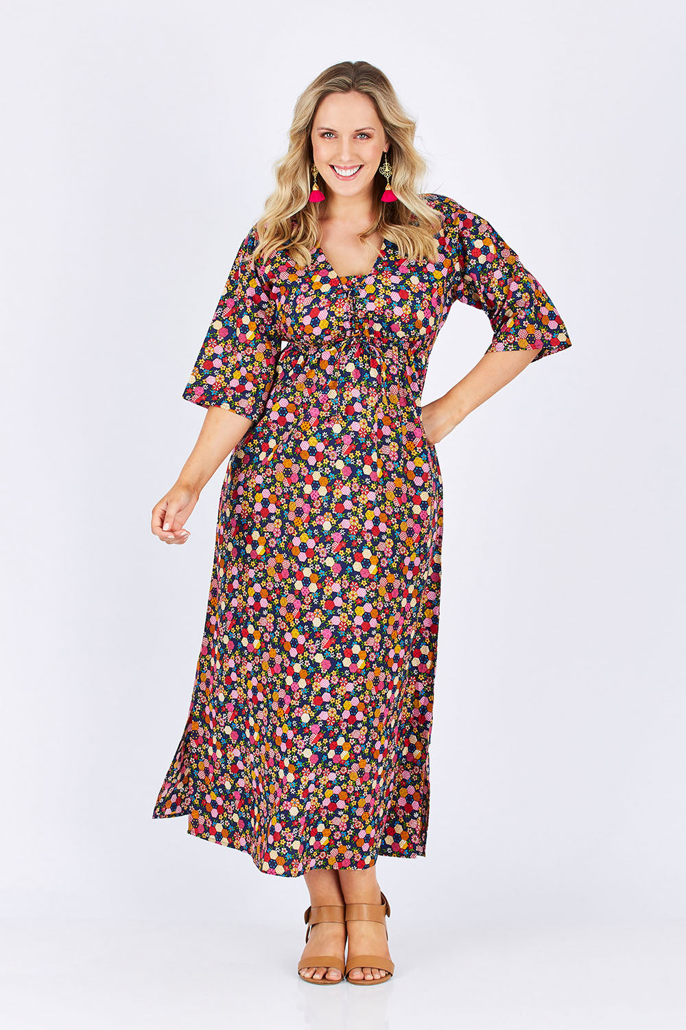 Model Jess wearing size M-L of the Gypsy Dress in colour Honshu (Black), from the front, showing the whole outfit