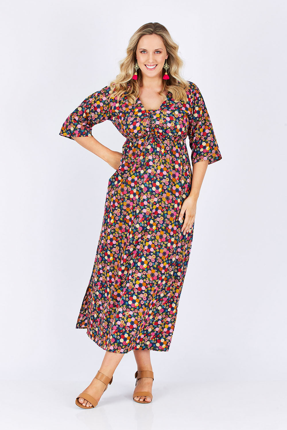 Model Jess wearing size M-L of the Gypsy Dress in colour Honshu (Black), from the front, showing the whole outfit
