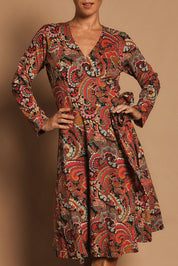 Model Katie wearing size S of the Sunburst Cotton Wrap Dress in colour Hackney, from the front, cropped image