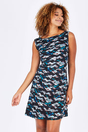 Model Summer wearing size S of the Camden Tunic in colour Kobe (Black), from the front, cropped image