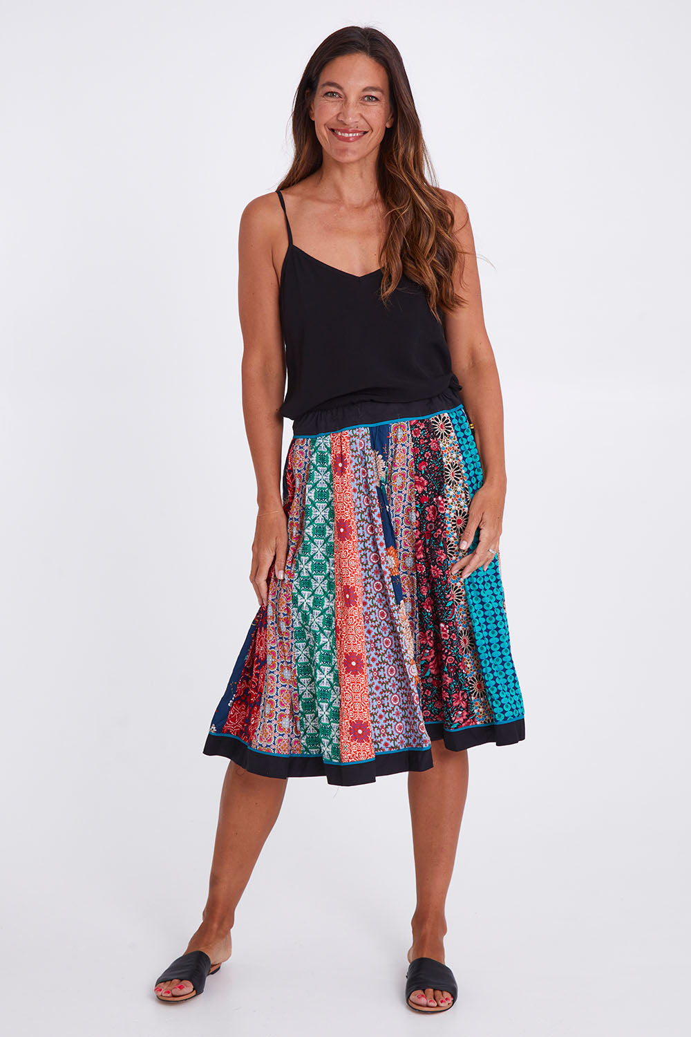 Model Alex wearing size OneSize of the Gypsy Panel Skirt in colour Multiprint (Blue), from the front, showing the whole outfit