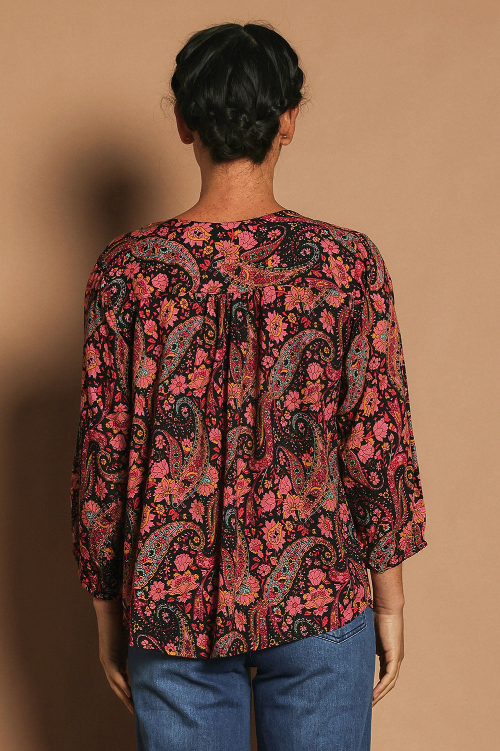 Model Katie wearing the Palais Top in colour Chelsea, from the back