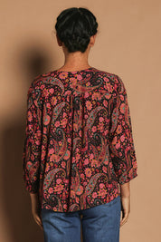 Model Katie wearing the Palais Top in colour Chelsea, from the back