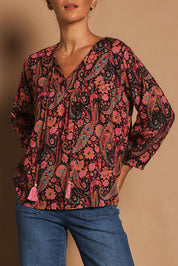 Model Katie wearing the Palais Top in colour Chelsea, from the front, cropped image