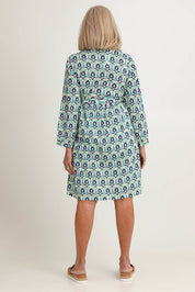 Model Sandy wearing size S of the Heidi Dress in colour Ikata, from the back