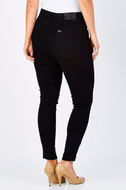 Model Laura wearing size 12 of the Hi Rider Skinny Jean in colour ExBlack (Black), from the back