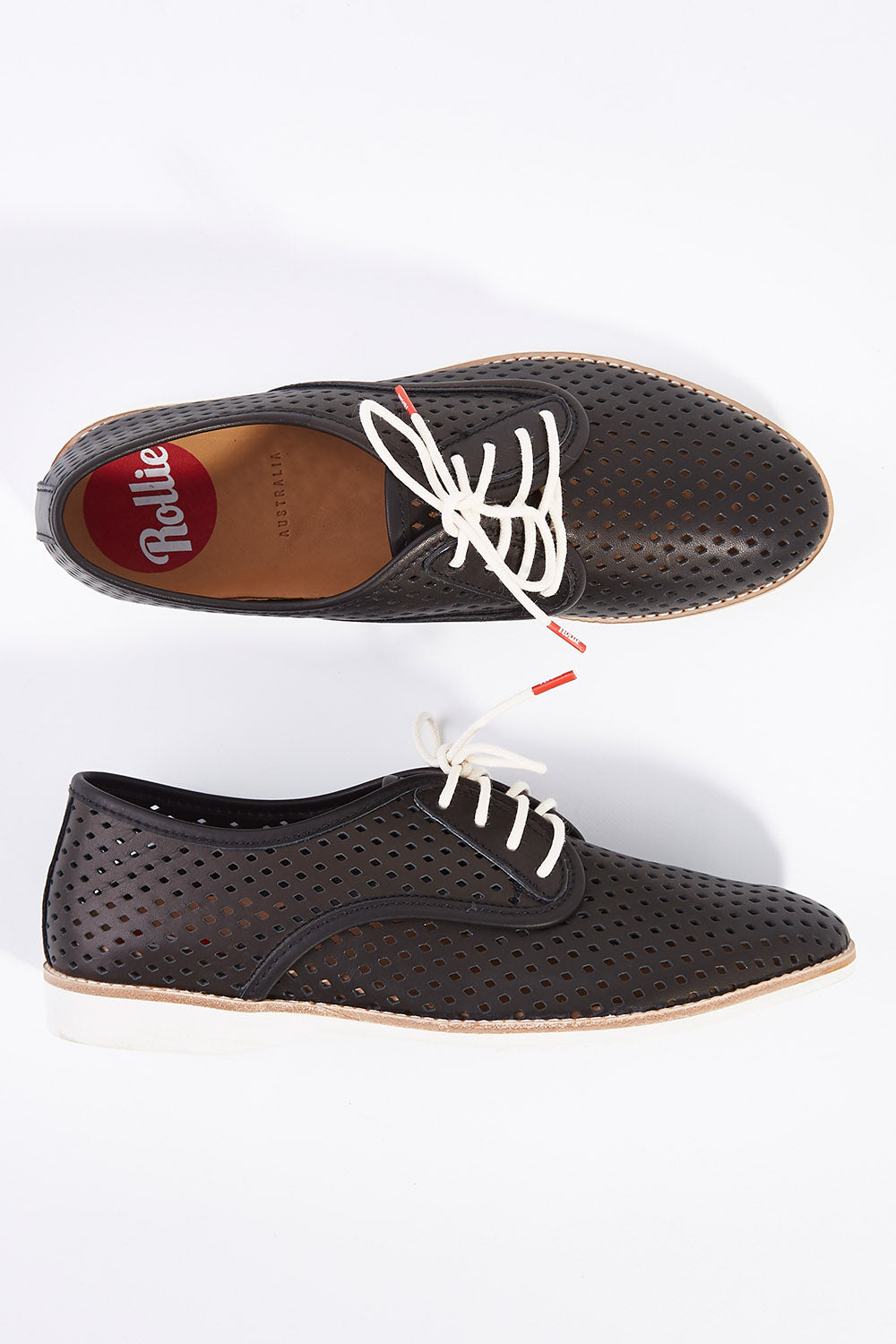 A model wearing size 38 of the Derby Punch Flat in colour Black (Black), from the front, showing the whole outfit