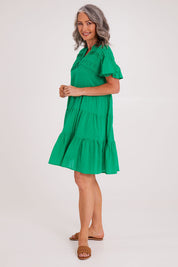 Model Luisa wearing size S of the Abigail Dress in colour Emerald (Green), from the front, showing the whole outfit