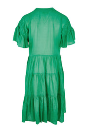 Product shot of the Abigail Dress in colour Emerald (Green), from the back