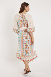 A model wearing the Biscay Cotton Blend Dress in colour White (White), from the back