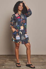 Model Ziara wearing size S of the Bonjour Cotton Shirtmaker Dress in colour Black (Black), from the front, showing the whole outfit