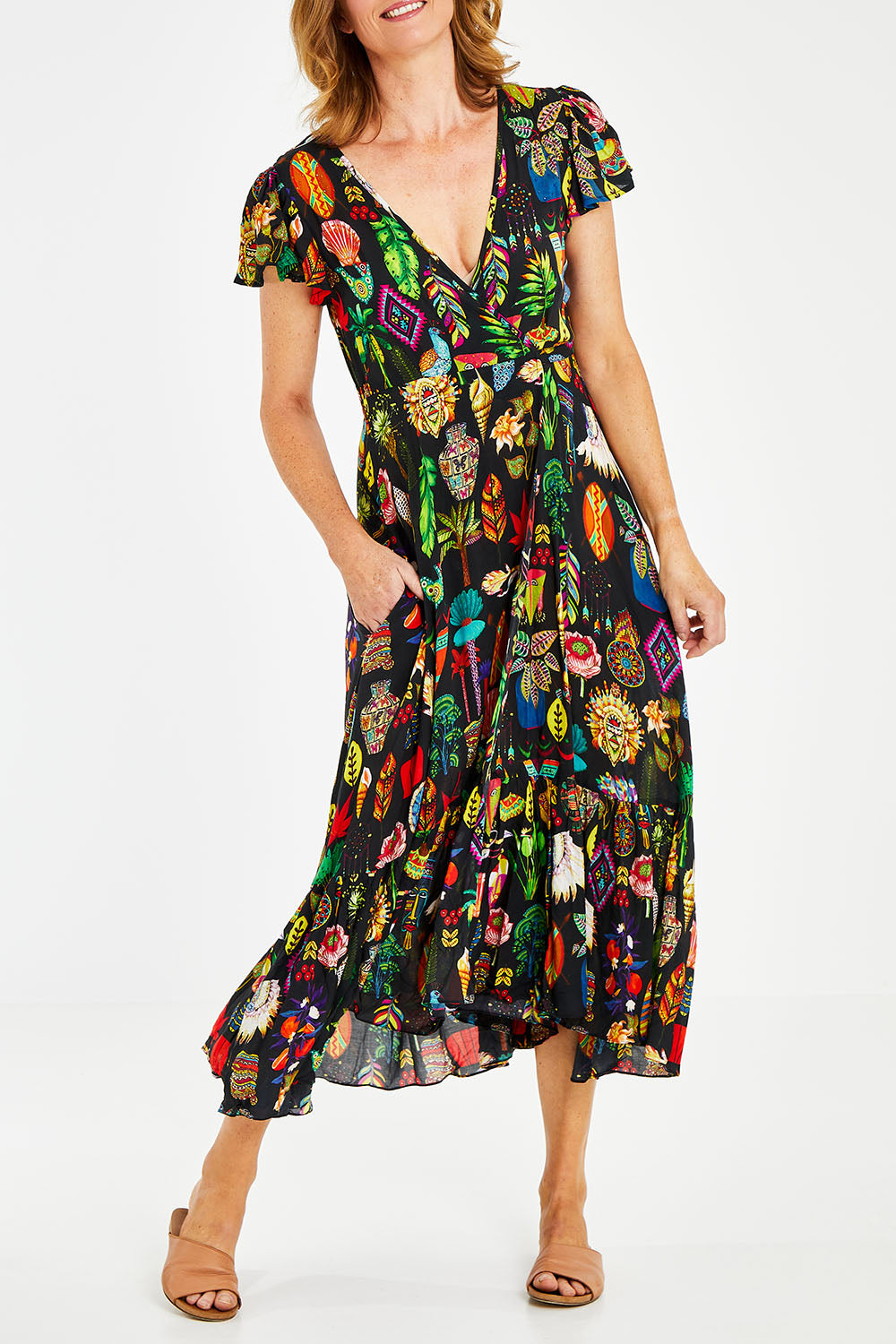 Model Naomi wearing size S of the Crawford Wrap in colour Black (Black), from the front, cropped image