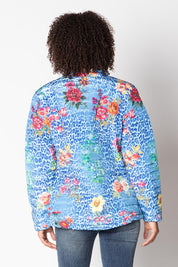 A model wearing the Florentyna Puffer Jacket in colour Blue (Blue), from the back