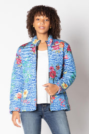 A model wearing the Florentyna Puffer Jacket in colour Blue (Blue), from the front, cropped image