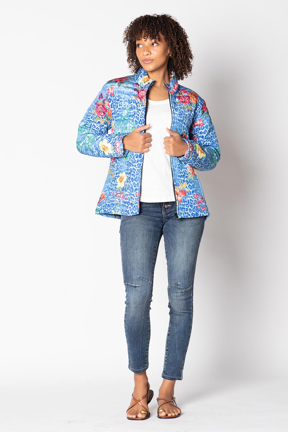 A model wearing the Florentyna Puffer Jacket in colour Blue (Blue), from the front, showing the whole outfit