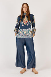 A model wearing the Garcia Shirt in colour Navy (Blue), from the front, showing the whole outfit