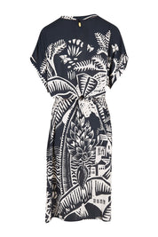 Product shot of the Georgia Dress in colour Navy (Blue), from the back