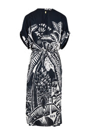 Product shot of the Georgia Dress in colour Navy (Blue), from the back