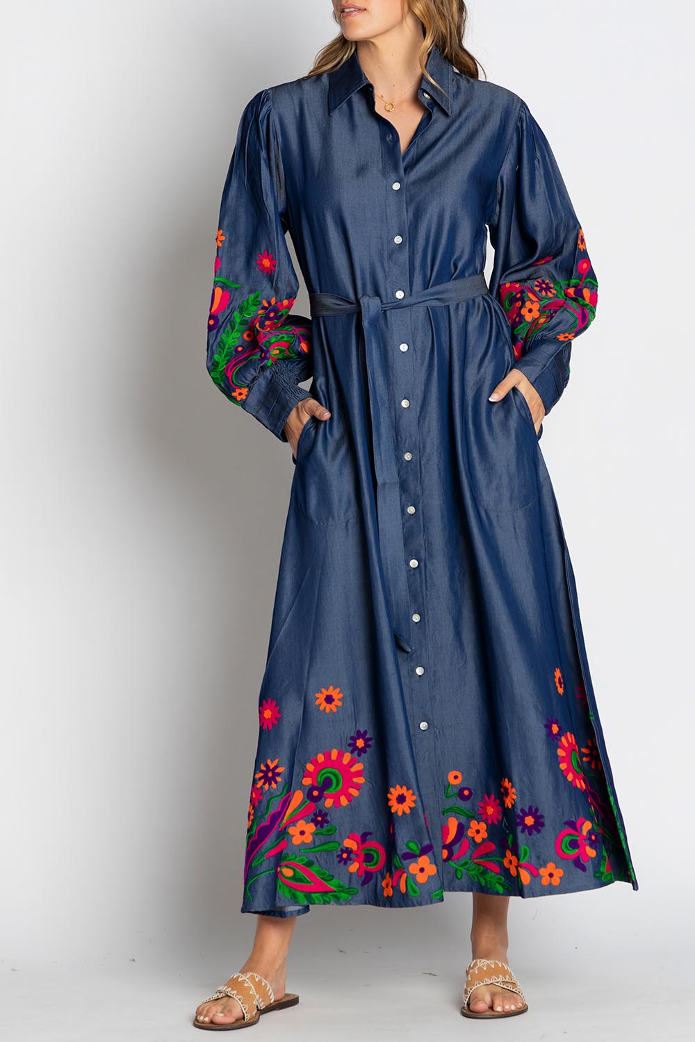 A model wearing the Gokarna Maxi Dress in colour Embroided (Blue), from the front, cropped image