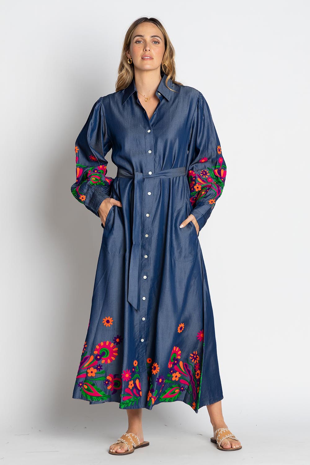 A model wearing the Gokarna Maxi Dress in colour Embroided (Blue), from the front, showing the whole outfit