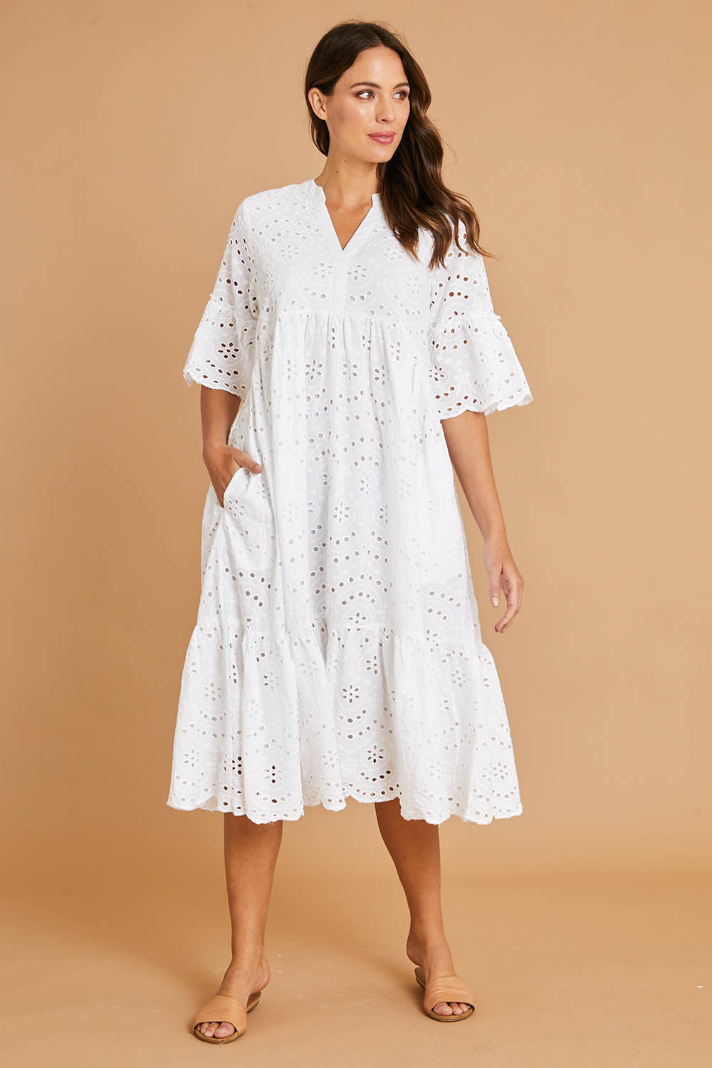 Model Madeline wearing size S of the Isla Midi Dress in colour White (White), from the front, showing the whole outfit