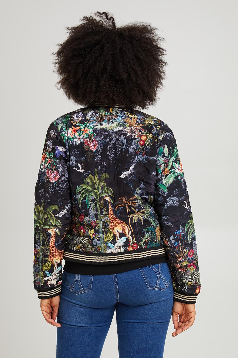 Model Olivia wearing size S of the Jungle Jacket in colour Black (Black), from the back