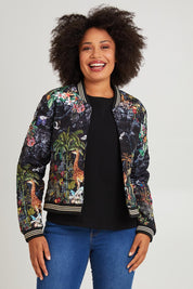 Model Olivia wearing size S of the Jungle Jacket in colour Black (Black), from the front, cropped image